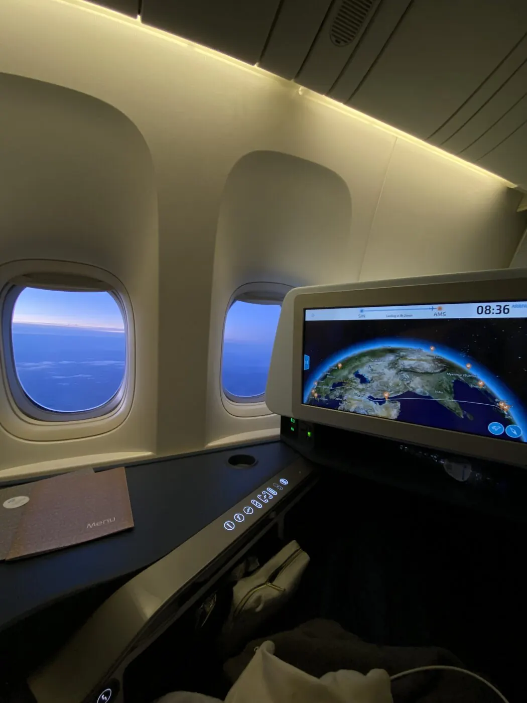 KLM World Business Class Boeing 777-300ER seat with flight map Singapore to Amsterdam